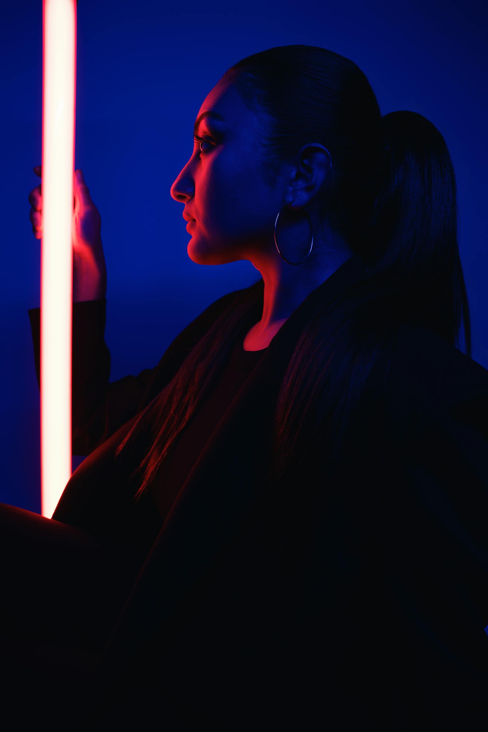 Bridge And Groom Standing While Holding Flower Bouquet